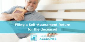 Older man reviewing paperwork at home, representing filing a Self Assessment tax return for a deceased person with help from North Devon Accounts