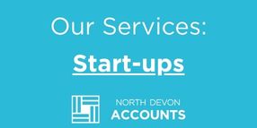 Person checking paperwork while using a phone and laptop, illustrating how to find a lost Unique Taxpayer Reference with guidance from North Devon Accounts