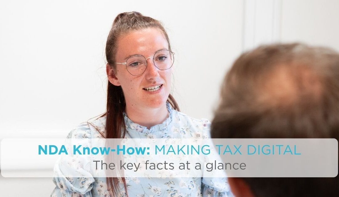 North Devon Accounts adviser discussing Making Tax Digital with a client for the NDA Know-How guide